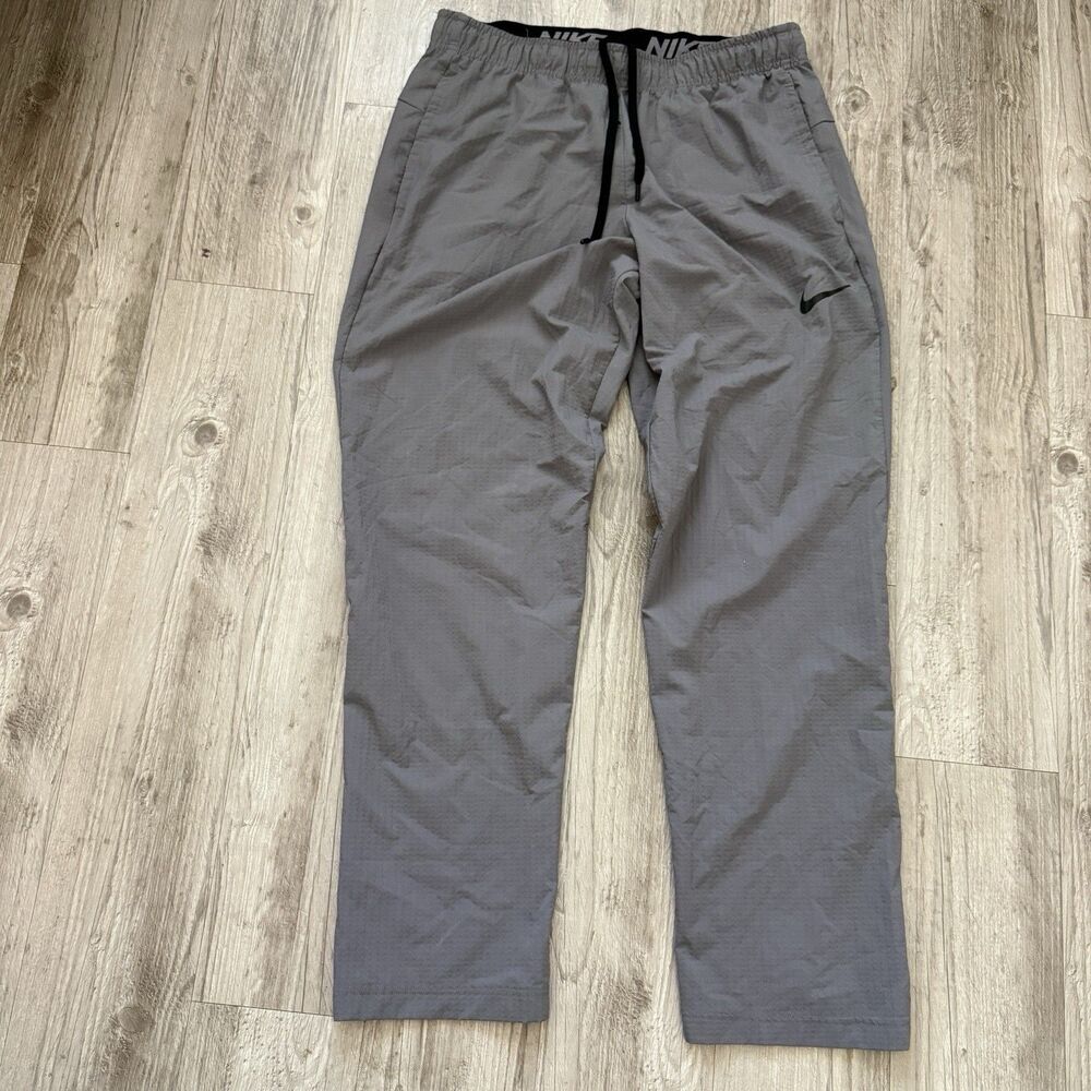 Nike Dri-FIT Track Pants Mens Size L Gray Tapered Drawstring Pockets